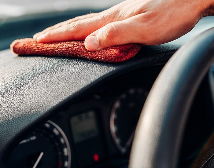 male-hands-cleans-auto-car-dashboard-polishing-2021-08-26-16-25-48-utc.jpg